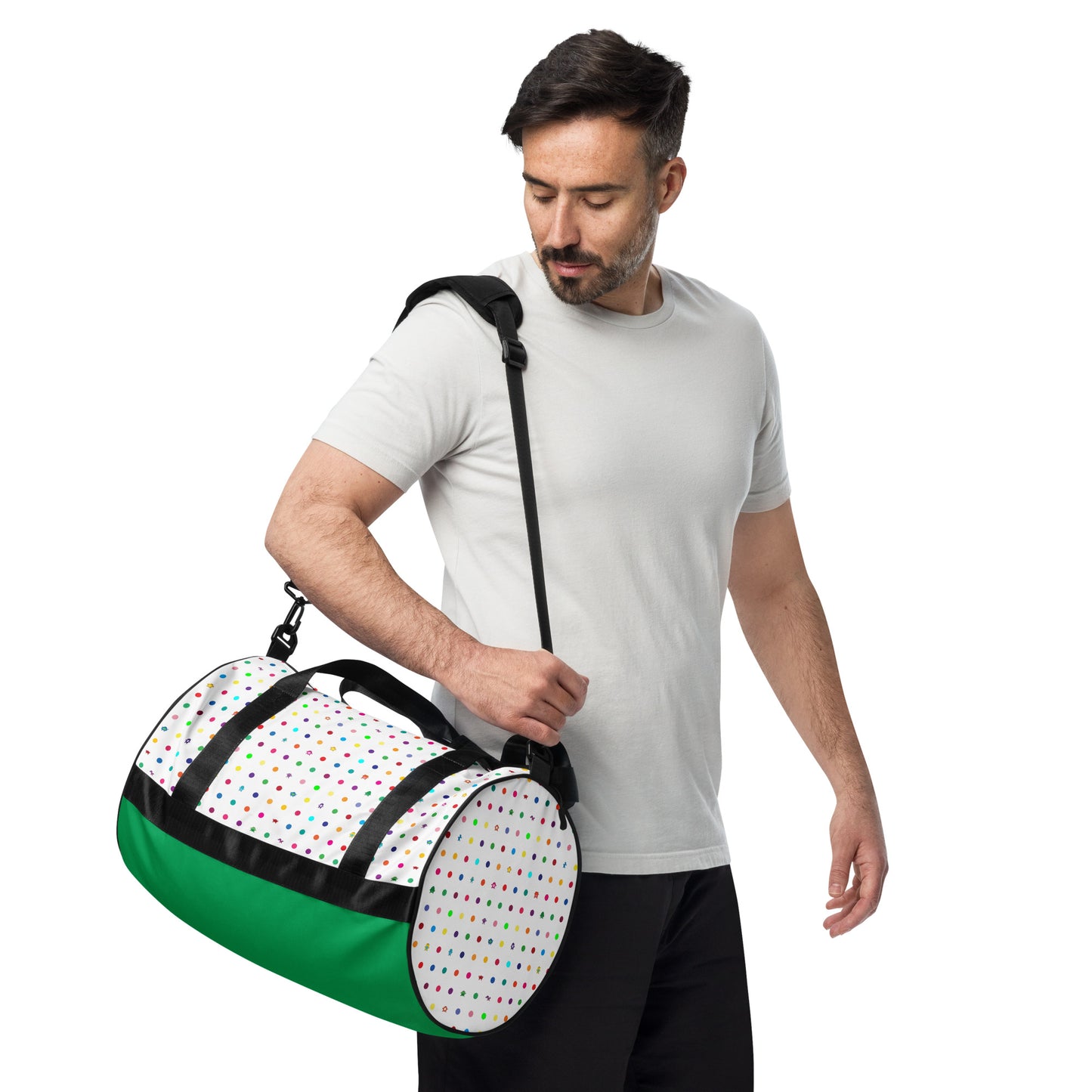 man holding Kids cute colourful dot graphic print on white gym bag black handles with green bottom