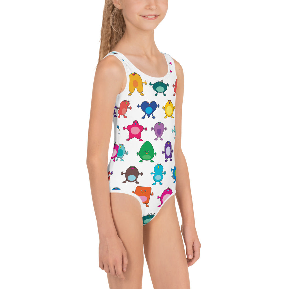white girls swim suit with large coloured monsters kid front view